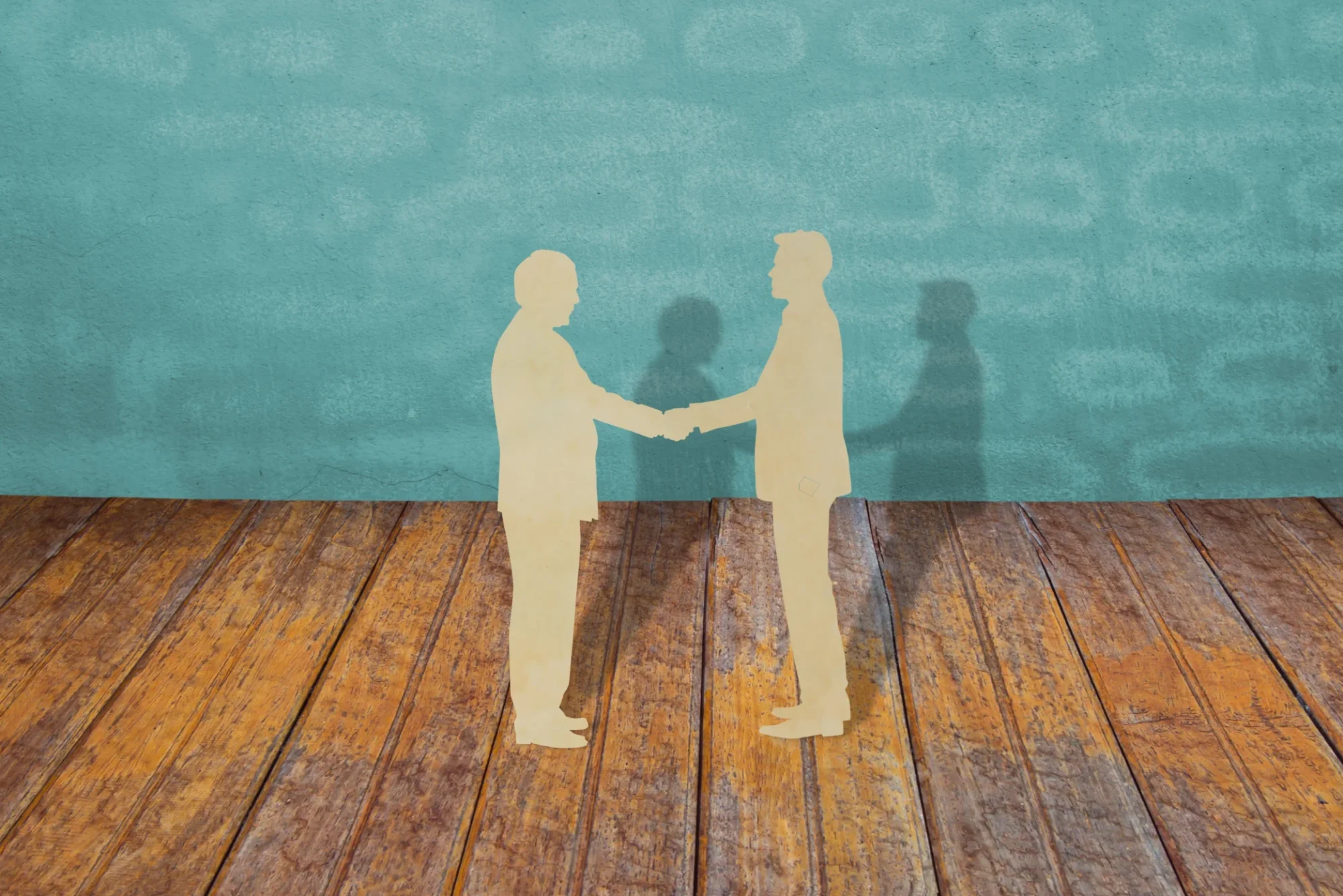 image de deux personnes qui se serre la main
